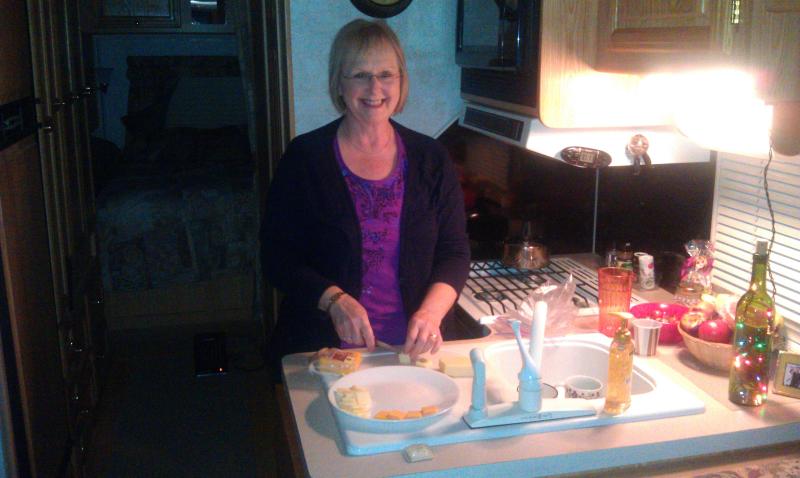 Bonnie is preparing snacks in her kitchen