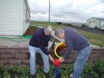 Bruce and Dick changing oil in Idaho
