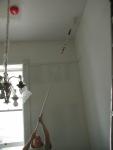 Bonnie painting the ceiling