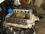 Reassembling the engine with new push rods and drilled heads