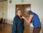 Jan getting a corsage