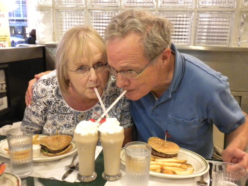 Sharing a malted at Mel's Drive-in.