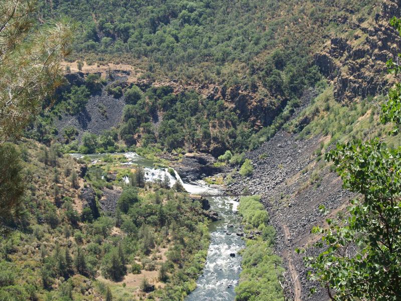 River in a valley below a picnic area