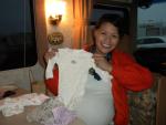Carmen with baby gifts